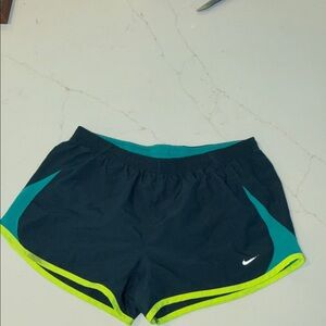 Nike Women's Dark Navy Athletic Shorts with Teal Panels and Neon Yellow Trim